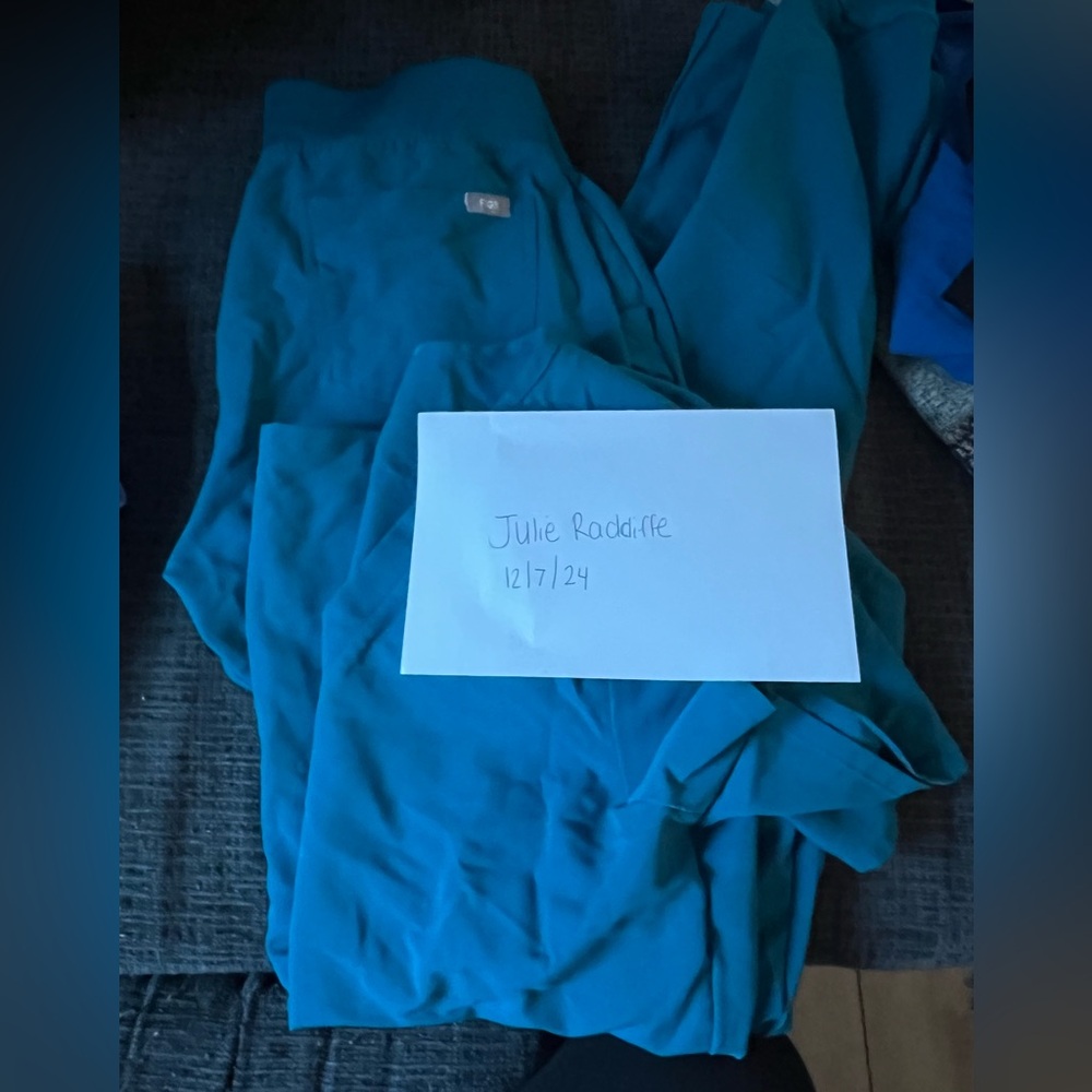 Light blue FIGS scrub set barely worn. Size medium